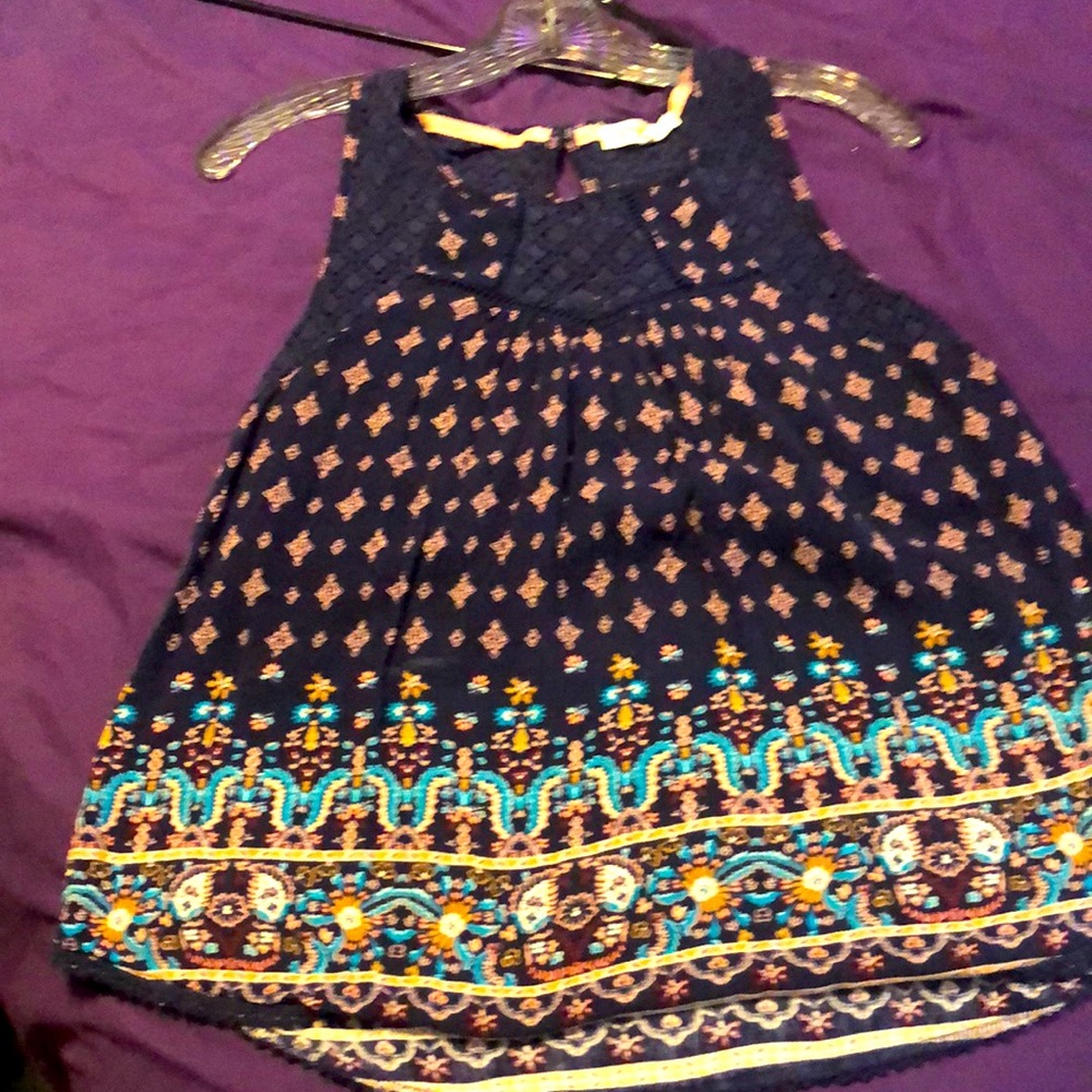 Boho style sleeveless blouse,crochet style front and back,very gently worn